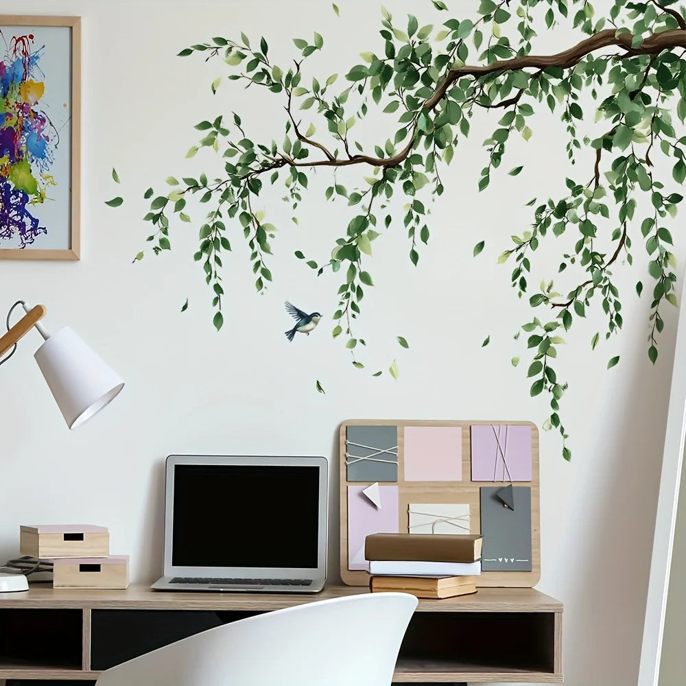 Decorative tree branch wall stickers featuring green leaves for a stylish home office decor