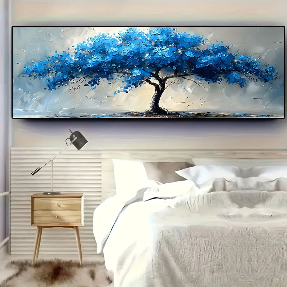 Vibrant blue tree of life canvas wall art hanging above a modern bedroom decor