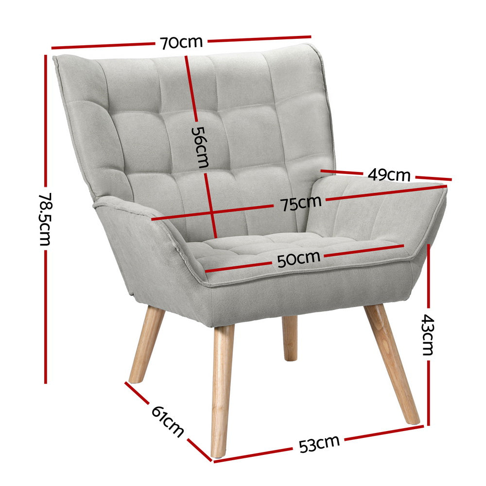 Nutshell Tufted Wingback Armchair in light gray fabric with wooden legs and detailed dimensions