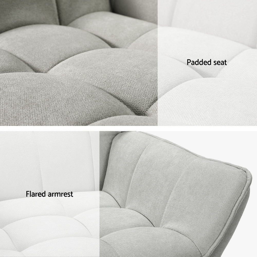Close-up of Tufted Wingback Armchair by Nutshell showing padded seat and flared armrest in gray fabric