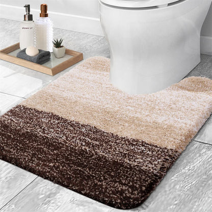 Nutshell U-shaped bath mat for toilet with soft, plush texture and stylish brown gradient design