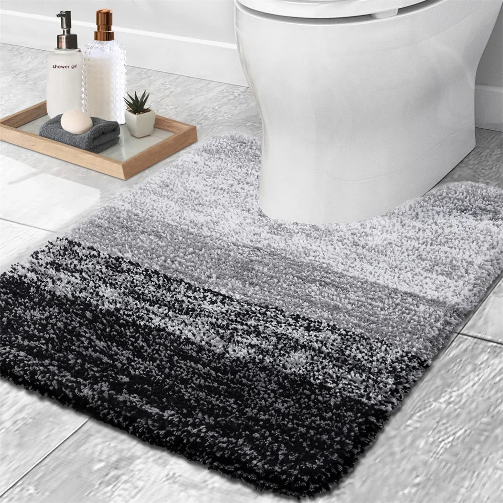 Soft U-shaped bath mat for toilet in gradient gray tones enhancing bathroom decor