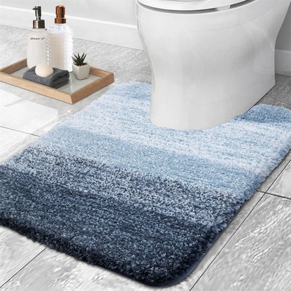 Soft blue gradient U-shaped bath mat for toilet with plush texture and modern design