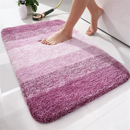 Soft U-shaped bath mat for toilet in pink ombre design, ideal for bathroom comfort