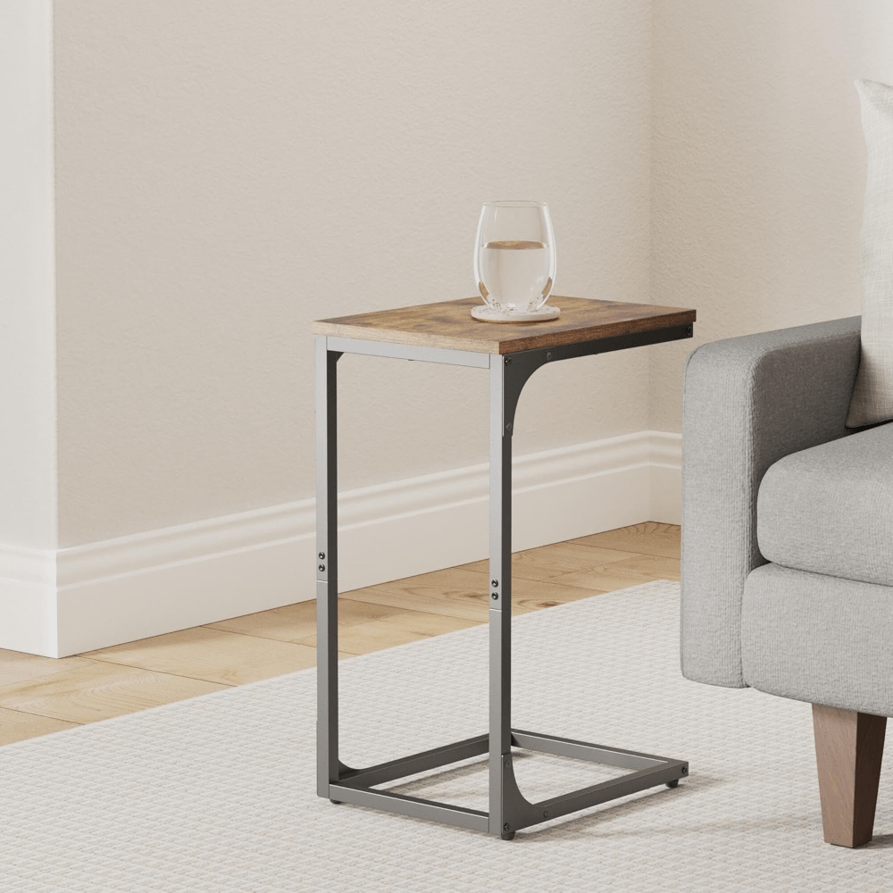 Nutshell C-shaped sofa side table set with a wooden top and metal base, perfect for small spaces