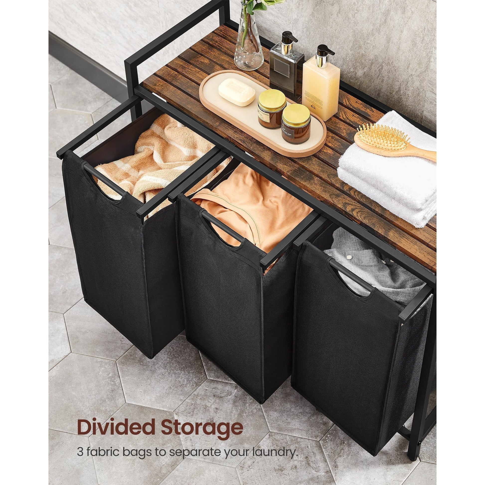Nutshell laundry hamper with removable bags featuring divided storage for organized laundry