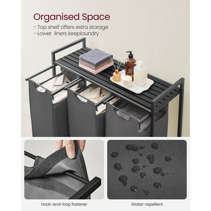 Nutshell laundry hamper with removable bags featuring organized space and water-repellent design