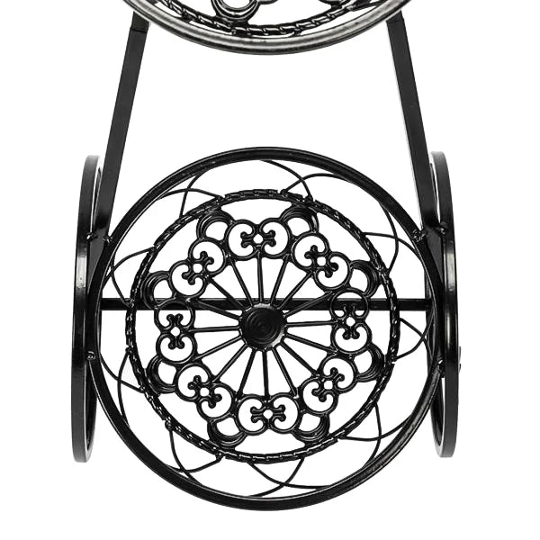 Nutshell rustic iron flower stand with decorative circular wrought iron design and sturdy wheels