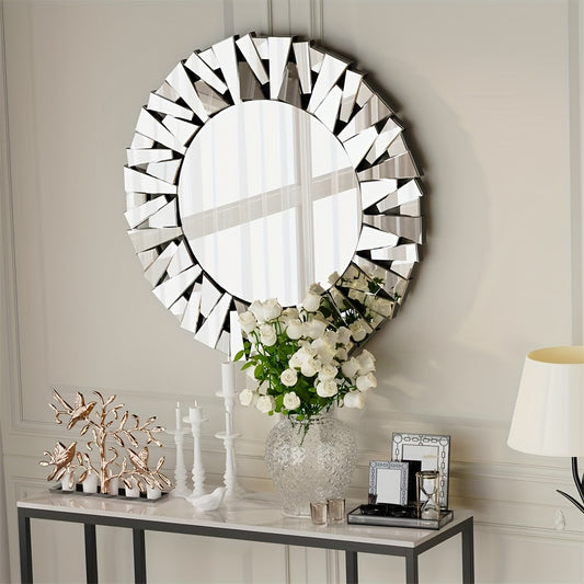 Nutshell silver beveled decorative mirror with geometric frame hanging above console table with flowers and decor