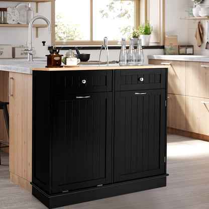 Nutshell black wooden tilt-out trash cabinet with dual compartments and silver handles in modern kitchen