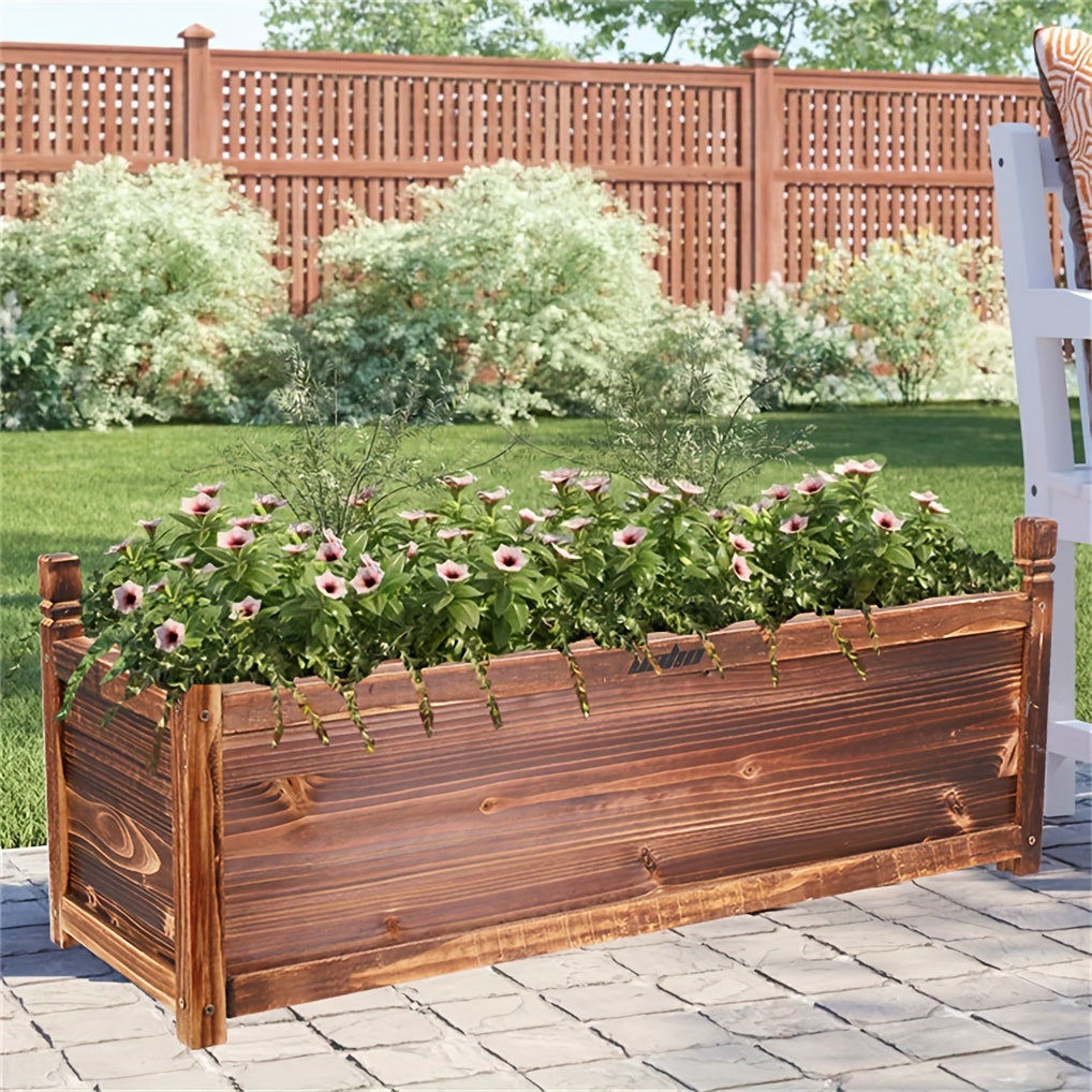 Nutshell Wooden Rectangular Planter Box Raised Garden filled with colorful flowers on a patio