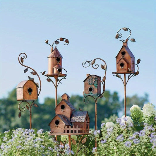 Set of vintage metal birdhouse feeders with decorative designs, perfect for garden decor