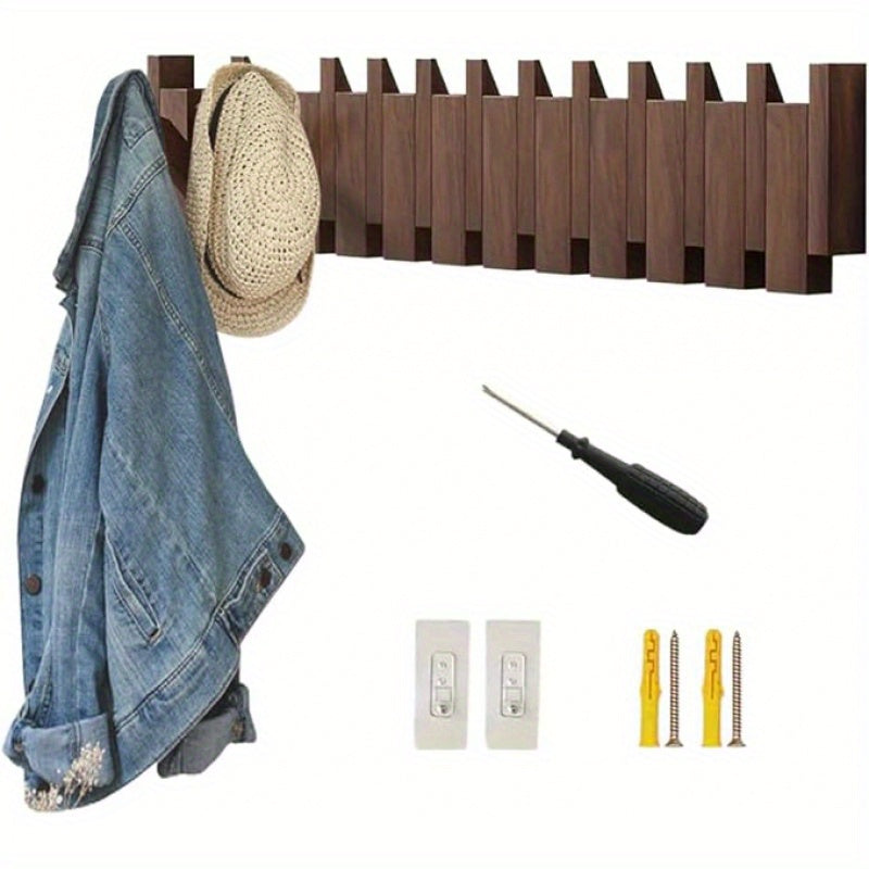 Nutshell wall mounted wooden coat hook featuring a stylish design with a jacket and a hat hanging