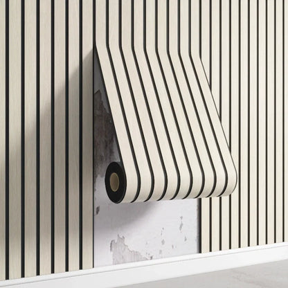 Nutshell woodgrain wallpaper roll with thin black vertical stripes peeling off wall to reveal damaged plaster