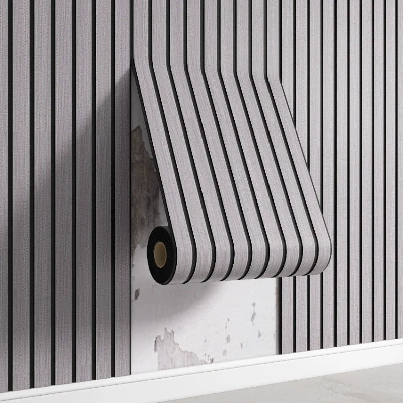 Nutshell woodgrain wallpaper gray vertical stripe design peeling to reveal wall showing removable application