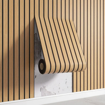 Nutshell woodgrain wallpaper peelback showing vertical slat woodgrain pattern with black grooves revealing damaged plaster wall