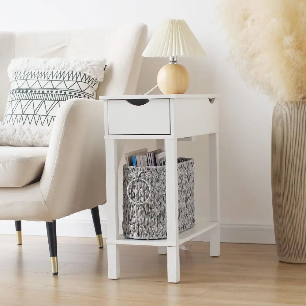 Stylish white side table featuring wicker woven toilet paper storage in a cozy living room setting