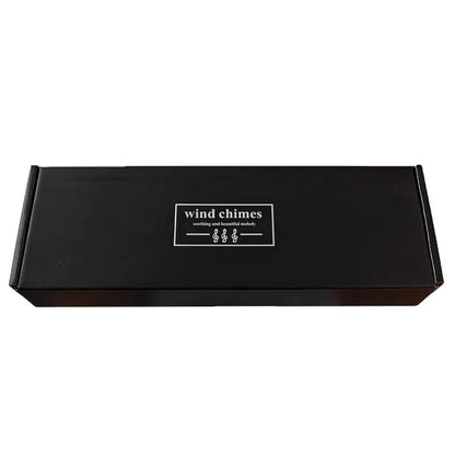 Nutshell 6 tube wind chimes for patio packaged in a sleek black box design