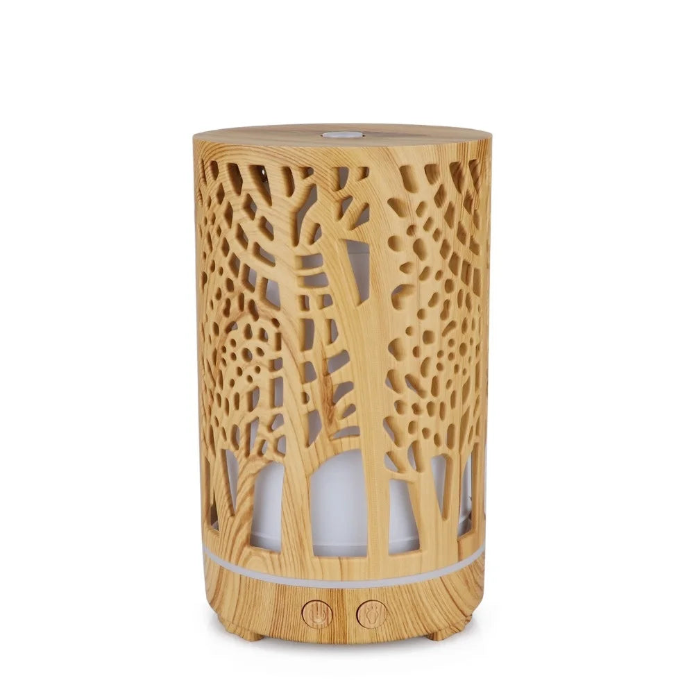 Nutshell wood grain essential oil diffuser with intricate tree pattern and dual control buttons