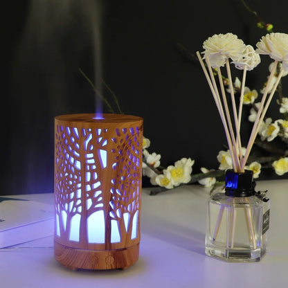 Nutshell wood grain essential oil diffuser with tree design and blue LED light emitting mist