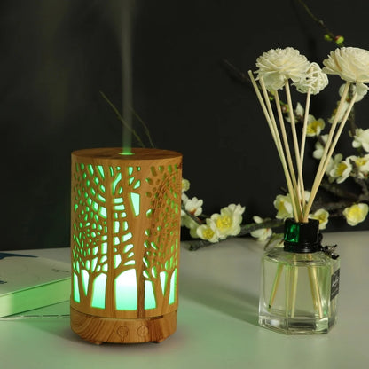 Nutshell wood grain essential oil diffuser with tree cutout design and green light emitting mist