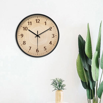 Nutshell wood grain wall clock with minimalist design and sleek black frame for home decor