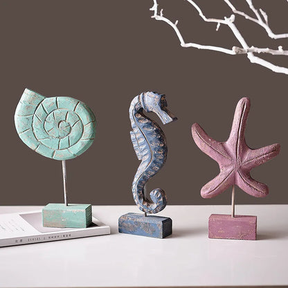Nutshell wooden ocean theme decorations featuring a blue seahorse, teal shell, and purple starfish ornaments