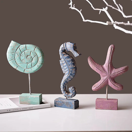 Nutshell wooden ocean theme decorations featuring a blue seahorse, teal shell, and purple starfish ornaments