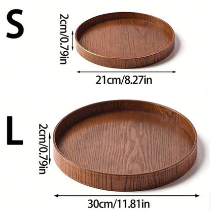 Small and large wooden serving tray by Nutshell with round shape and natural wood finish