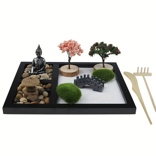Nutshell Zen garden sand tray with decorative trees, stones, a Buddha statue, and rakes
